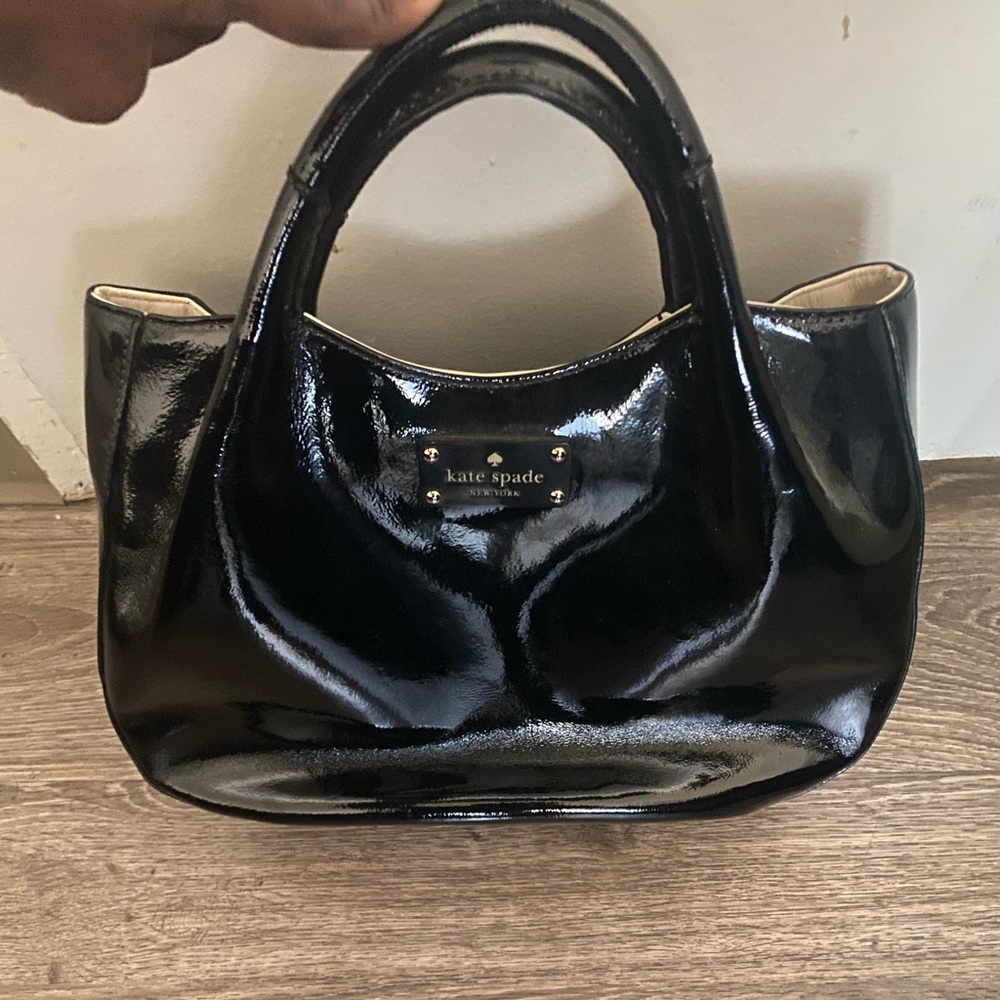 Brand new Kate spade ! Stored away , no damages or tears
